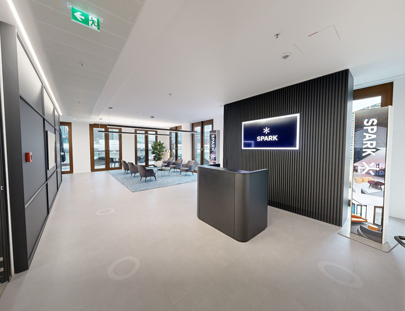 Sky Hall, 24-seat plenary room on Floor 6 with skyline daylight.