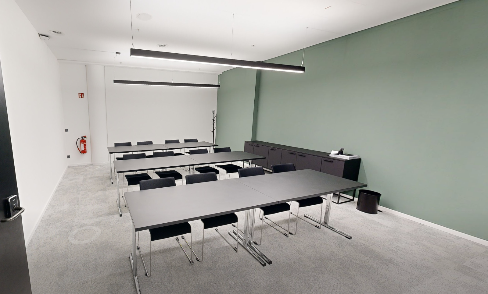 Straight-up, stand-up meeting room on Floor 5, standing-height table for 8.